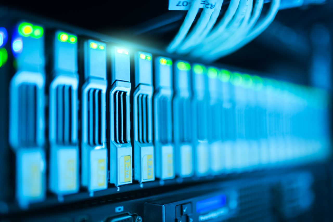 hero-img Detailed image of a server rack with glowing lights in a modern data center.